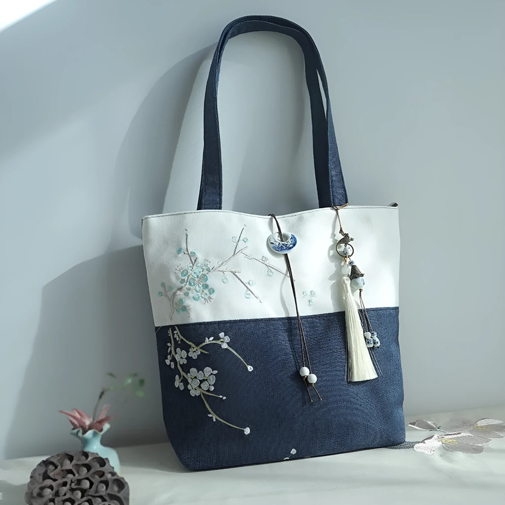 Artistic retro canvas shoulder handbag with hand-painted literary design and copper zipper