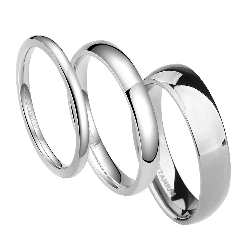 Solid titanium steel unisex ring in matte silver finish, shown in 2mm, 4mm, and 6mm band widths.