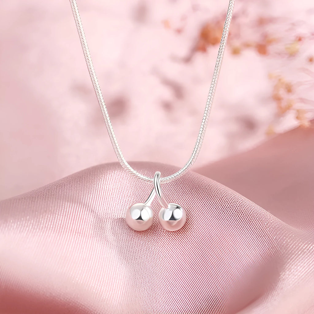 Silver cherry pendant necklace on a snake bone chain, adjustable length, Korean style.