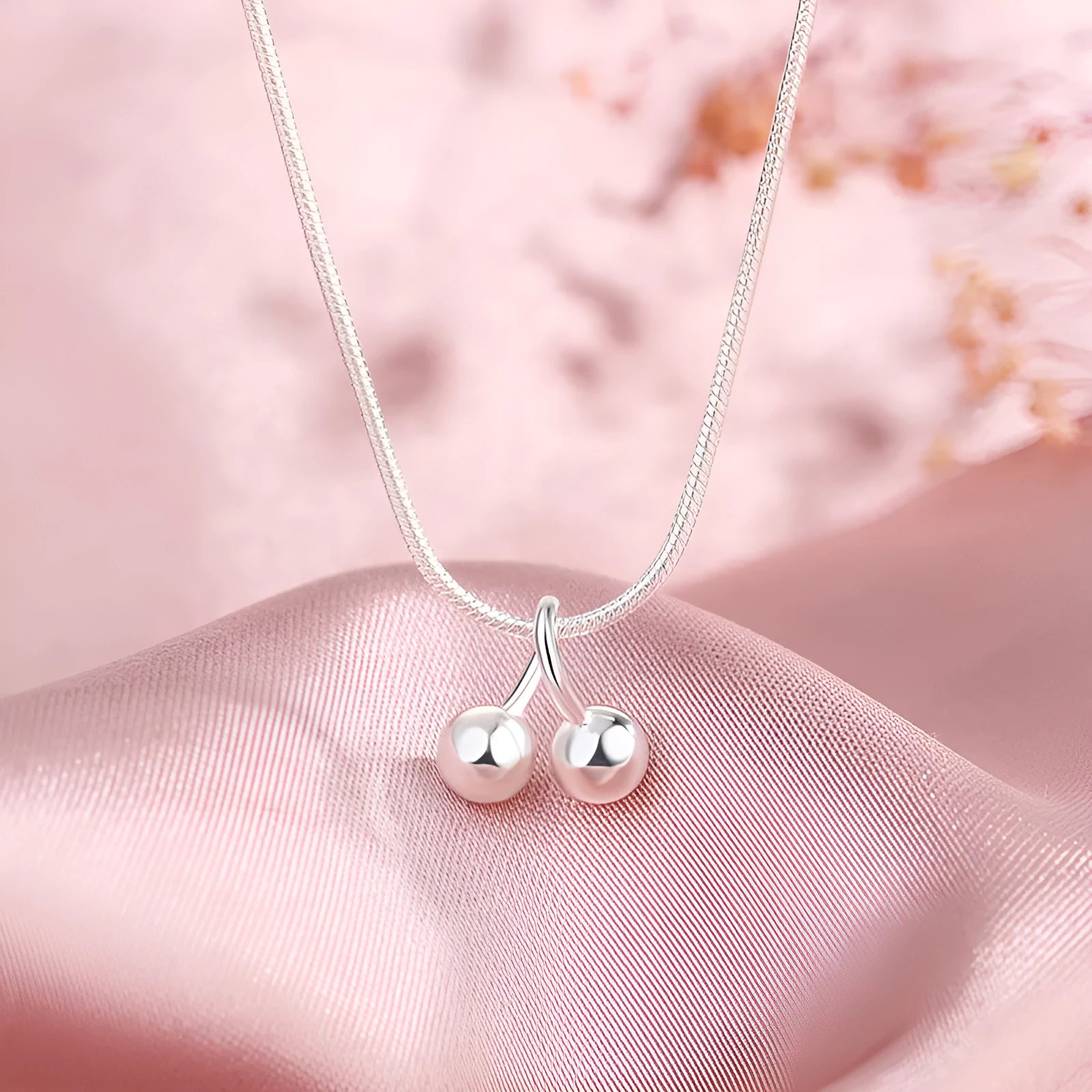 Silver cherry pendant necklace on a snake bone chain, adjustable length, Korean style.