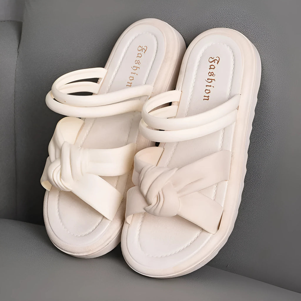 Women's black and white two-way wear sandals with soft thick back and non-slip PVC sole.