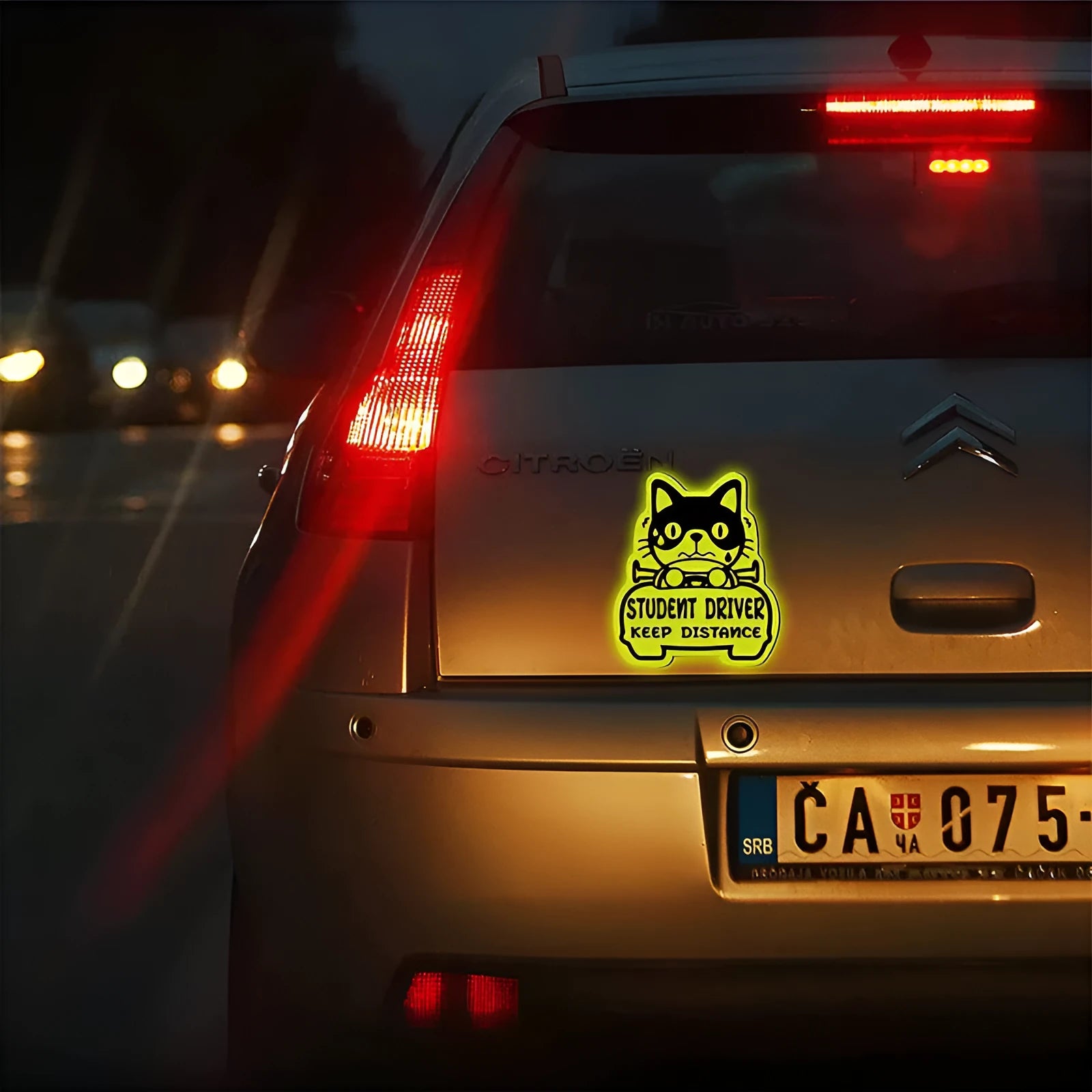 Set of three magnetic reflective stickers with cat, duck, and panda designs for bikes and scooters.