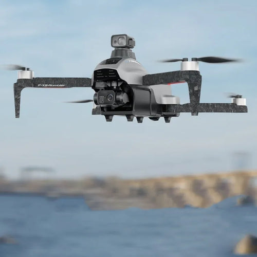 White folding quadcopter drone with camera and obstacle avoidance sensors on a remote control.