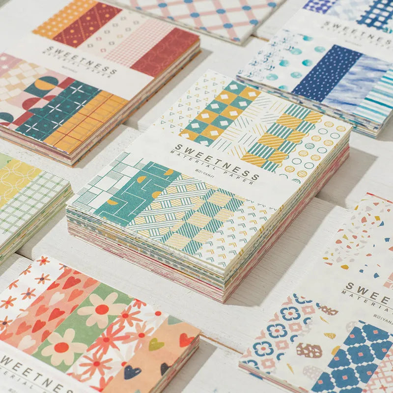 Pack of 50 retro collage material note papers in dessert colours like red plum and caramel, each sheet 56mm by 83mm.