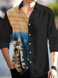 Man wearing a loose-fitting floral print Hawaiian shirt with long sleeves.