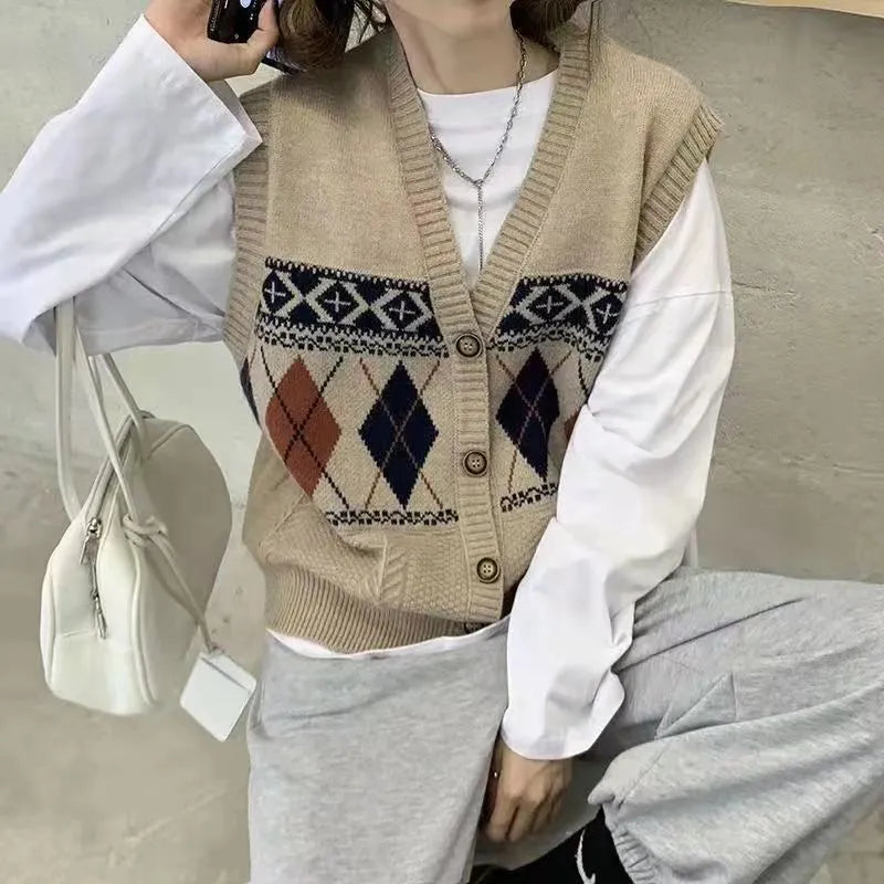 Loose diamond plaid sleeveless cardigan top in khaki colour showing pattern detail