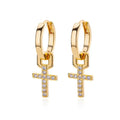 Cross stud earrings with 18K gold plating and clear zircon stone on a white background