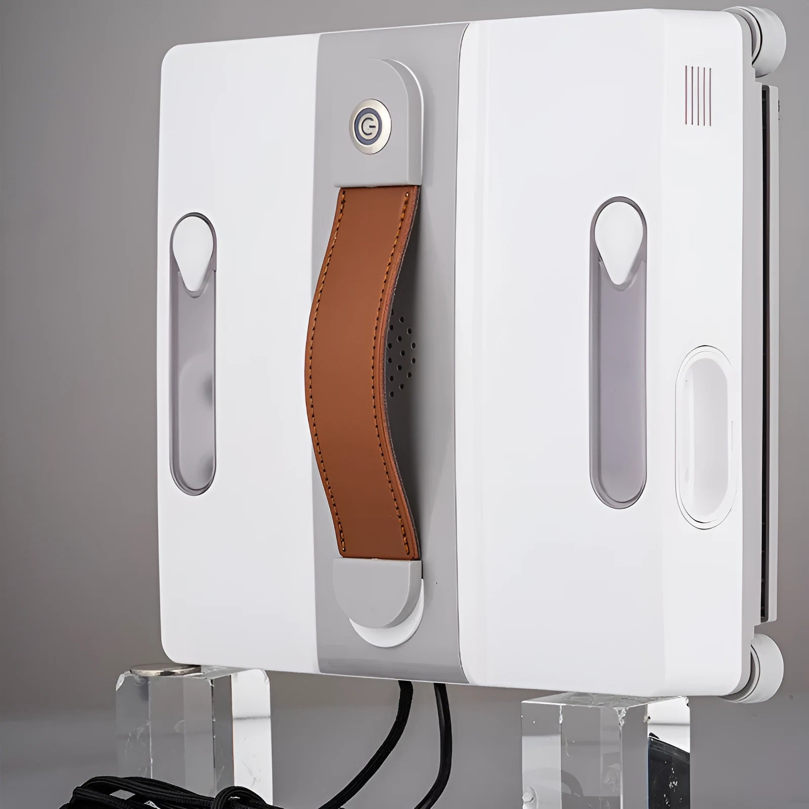 White intelligent window cleaning robot on a glass window, dimensions 220mm by 220mm by 70mm.