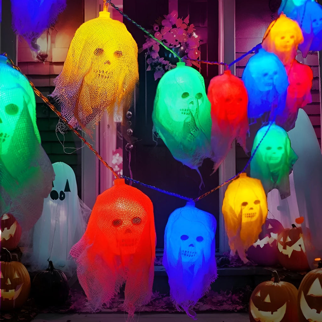 Halloween decoration LED fairy lights in coloured or warm white on a dark wall