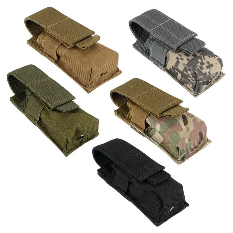 Black tactical MOLLE pouch with elastic cord closure for pistol cartridges or a small flashlight.