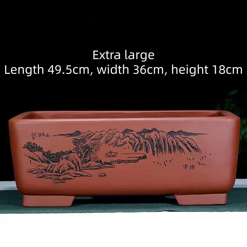 Large handmade rectangular purple clay bonsai pot in deep blue black for pine trees.