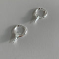 Geometric star stud earrings for women with white gold plated finish on copper.