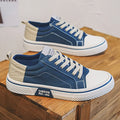Men's blue canvas casual skateboarding shoes with round toe and lace-up front