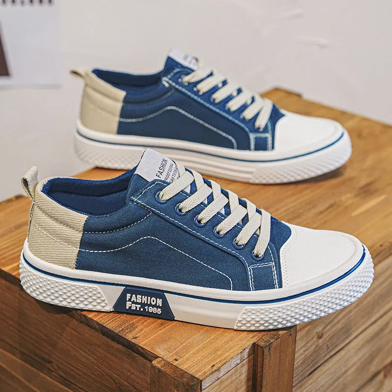 Men's blue canvas casual skateboarding shoes with round toe and lace-up front