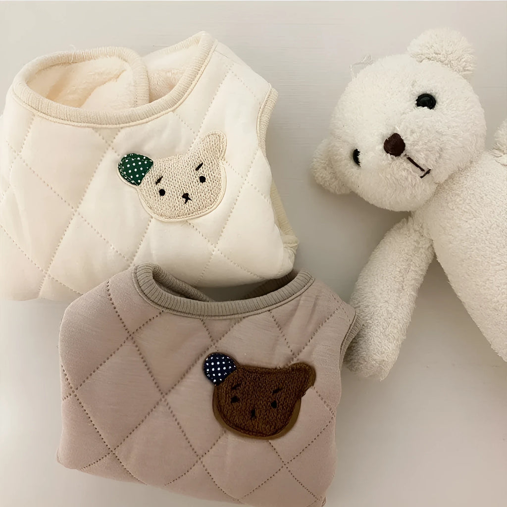 Quilted pet vest with embroidered bear patch and polka-dot ears, cream beige colour, for small dogs, side view
