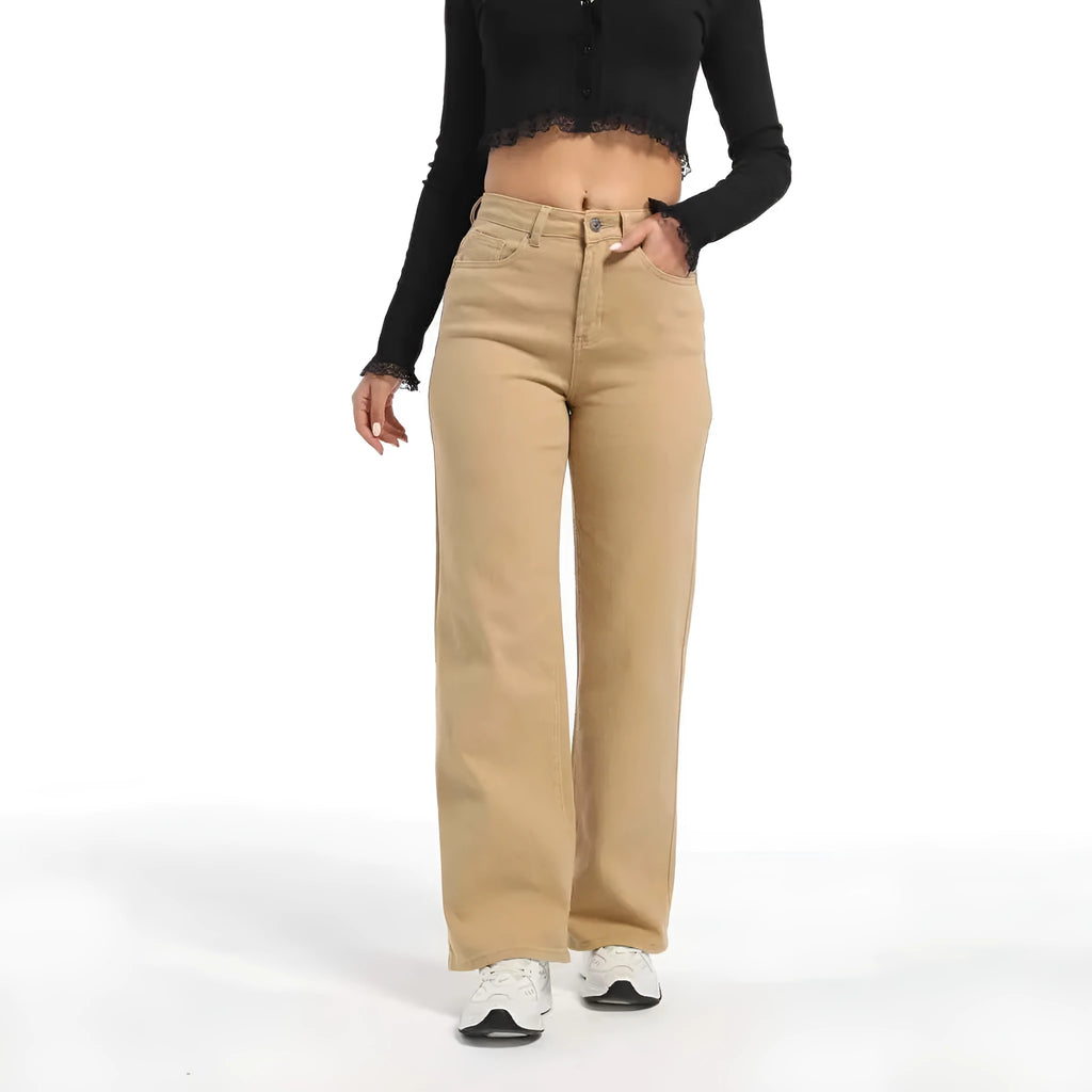 Women's high-waist straight leg cotton trousers in apricot colour, showing wide-leg silhouette.