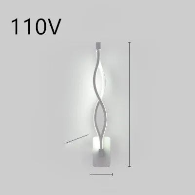 Minimalist Nordic design LED wall lamp with a silicone shade, mounted on a bedroom wall.