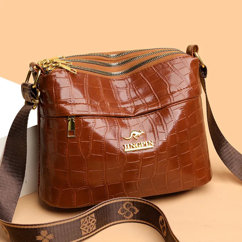 PU leather cross body messenger bag with multiple compartments in horizontal square suitcase shape