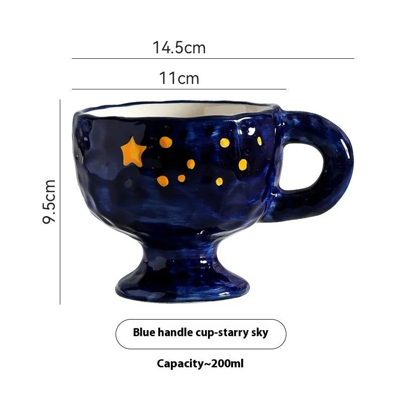 Hand-pinched irregular ceramic mug showing solid colour and unique shape