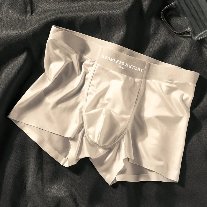 Men's ice silk boxer shorts in solid colours showing mid waist traceless design