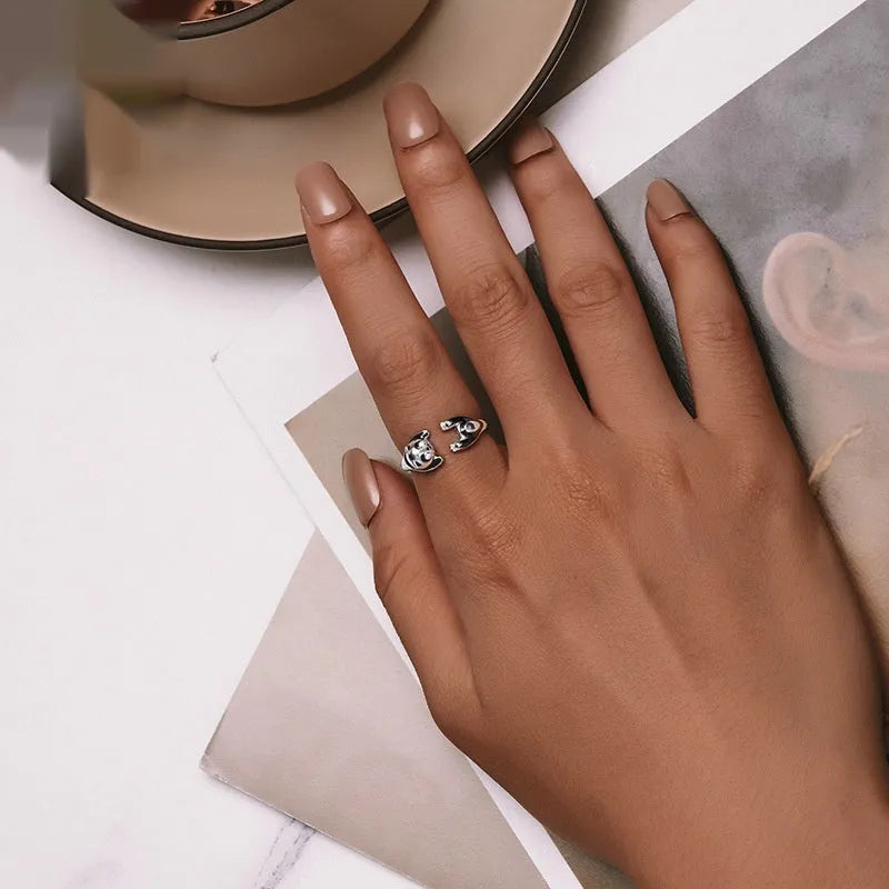 Adjustable sterling silver panda ring with white gold plating and open design