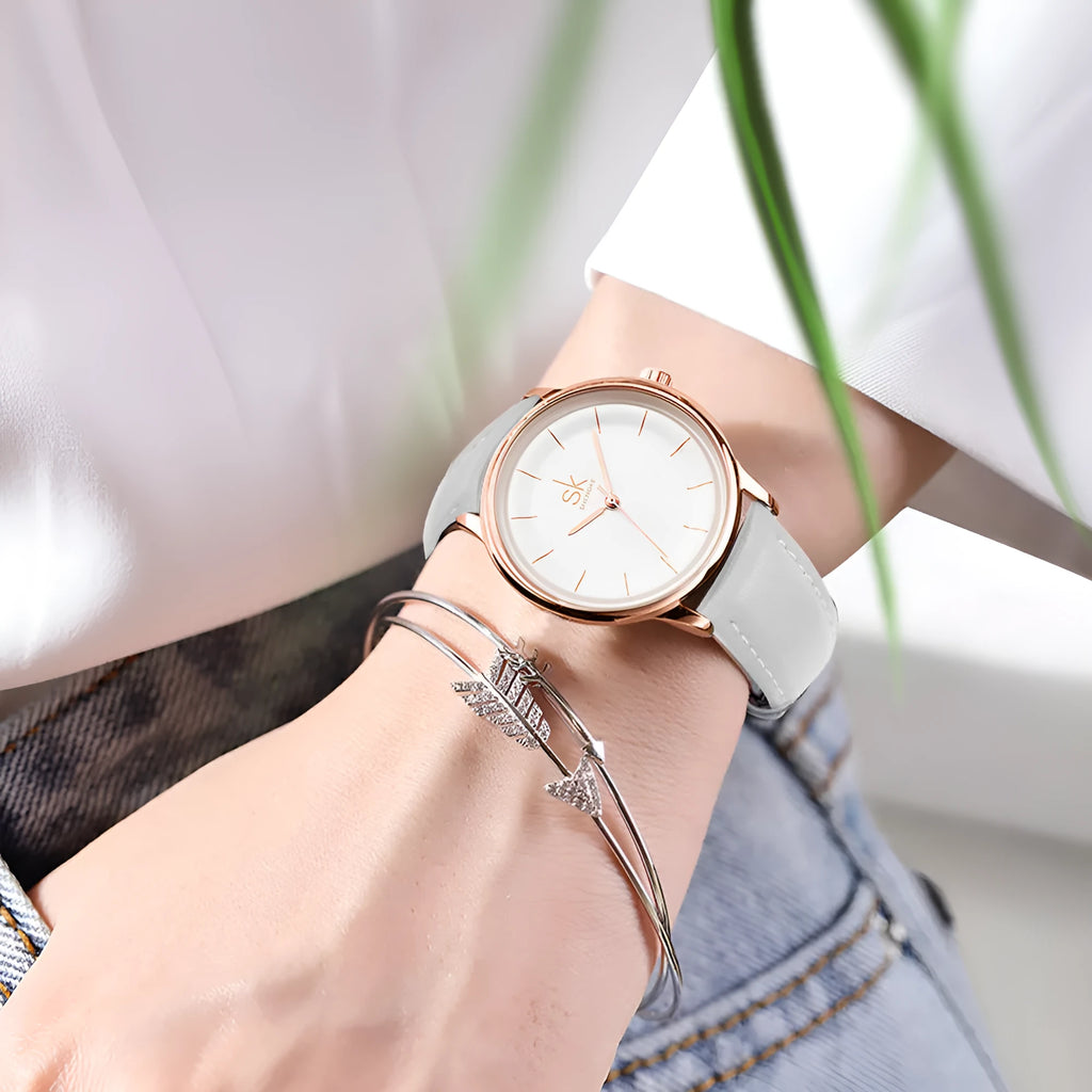 Women's quartz watch with round rose gold alloy case and white PU strap, 38mm dial, stainless steel buckle