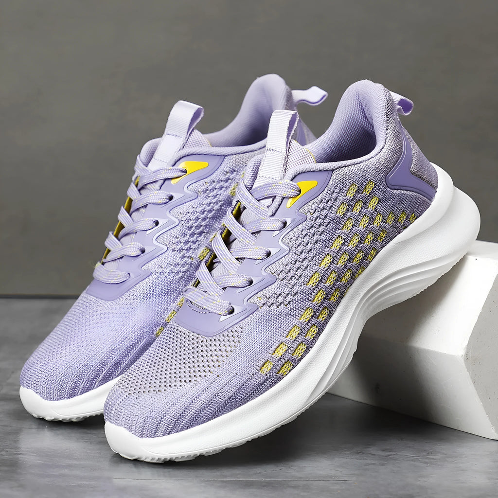Women's lavender purple Flyknit running shoes with mesh lining and striped pattern.