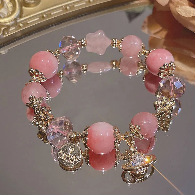 Women's galaxy colour bracelet with snowflake pendant, bow design, heart shape and cartoon character elements