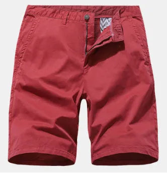 Man wearing blue printed denim casual shorts with a loose fit and straight leg, showcasing the no-belt workwear style.