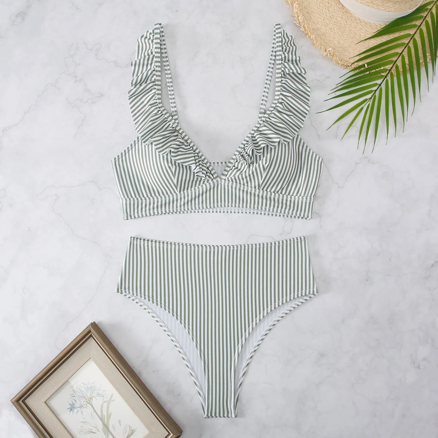 Retro striped split bikini swimsuit in black and white stripes on mannequin