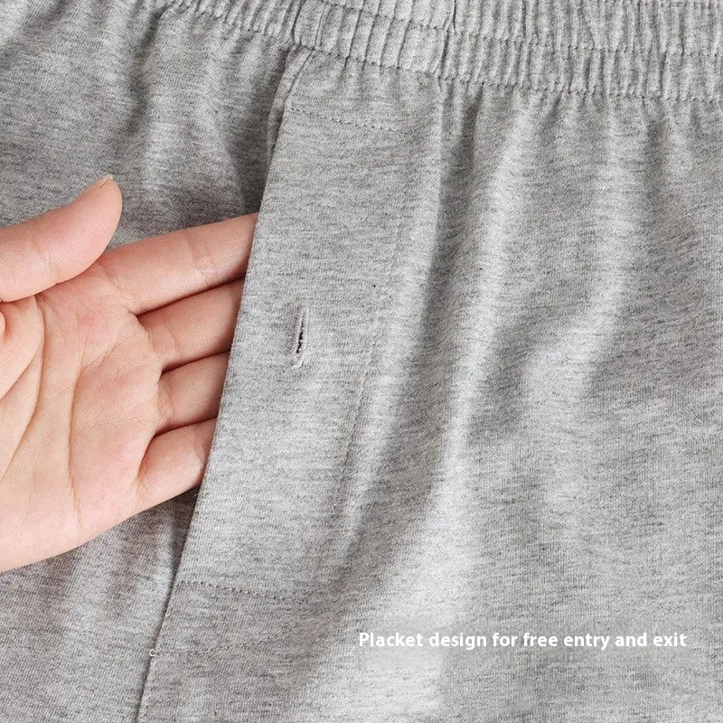 Men's solid colour cotton boxer shorts on a white background, showing loose fit and high waistband.