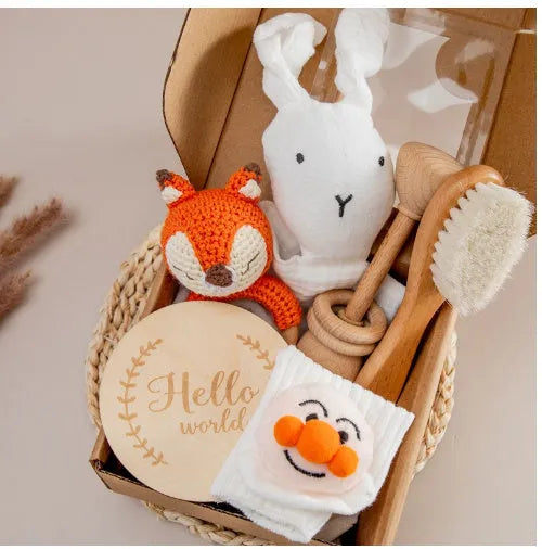 Baby teething toy gift set with bamboo cotton blanket and natural beech wood components