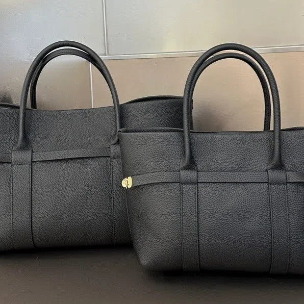 Women's genuine leather single shoulder handbag in horizontal square shape with stitching detail