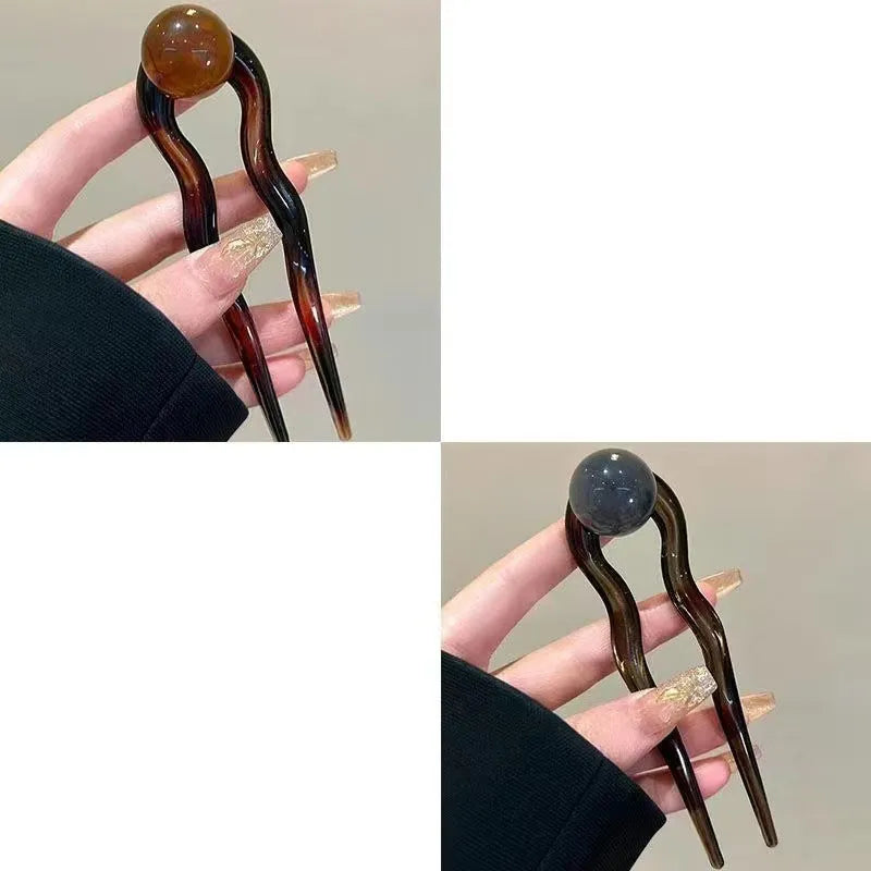 Simple U-shaped acrylic barrettes with ball retro design in beige, caramel, dark gray and green colours