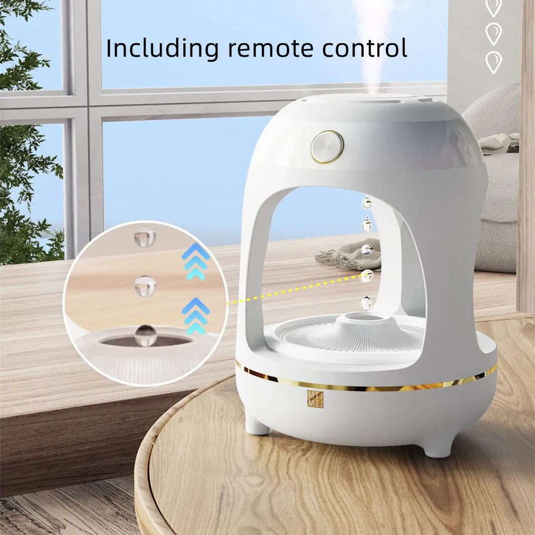 Rose gold and white levitating water drops ultrasonic humidifier and LED night light on a desk