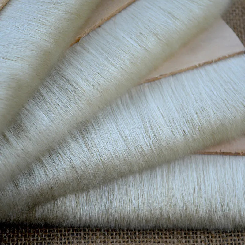 Natural wool brush for art mounting and shading craft projects in four size options.