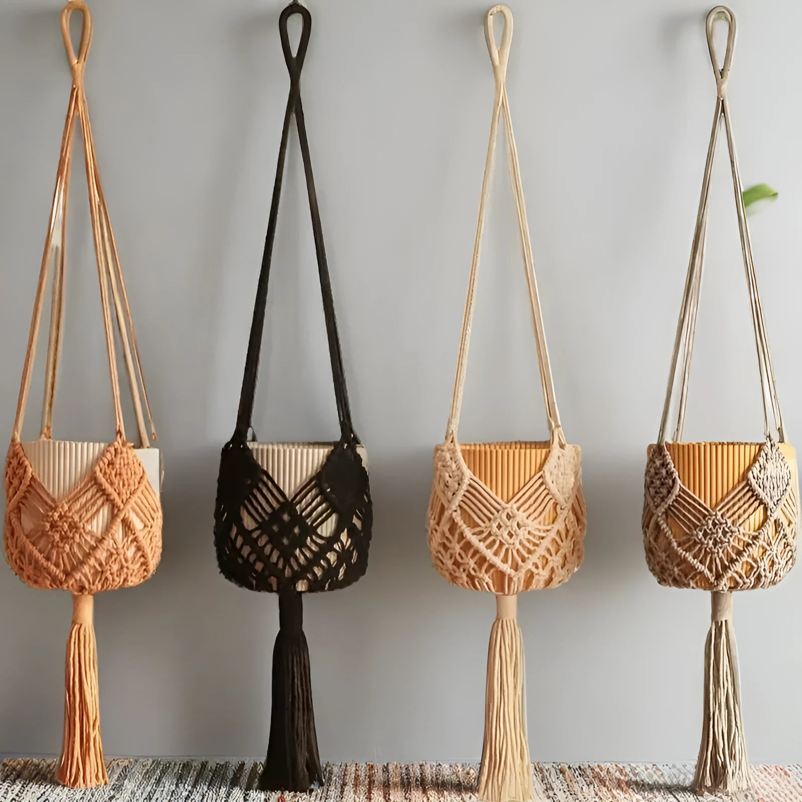 Hand-woven polyester cotton flower pot cover in brown colour with textured surface