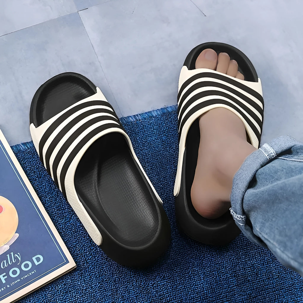 Unisex casual slipper with PVC upper and EVA sole in a leisure sports style, shown in beige colour.