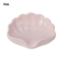 Shell-shaped plastic soap dish in pearl white or cherry blossom pink for bathroom storage