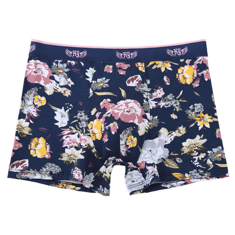 Men's floral print cotton boxer shorts showing the U-shaped pouch design and available colour variations.