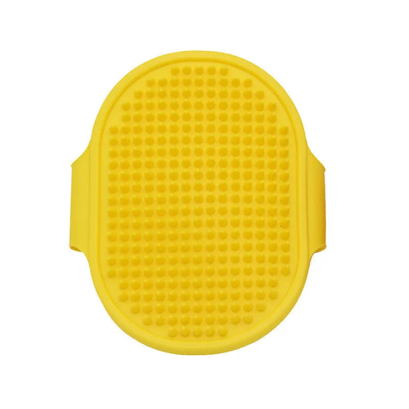 Elliptical hand-shaped plastic dog bath brush in blue, 120x90x20mm, for general pet grooming