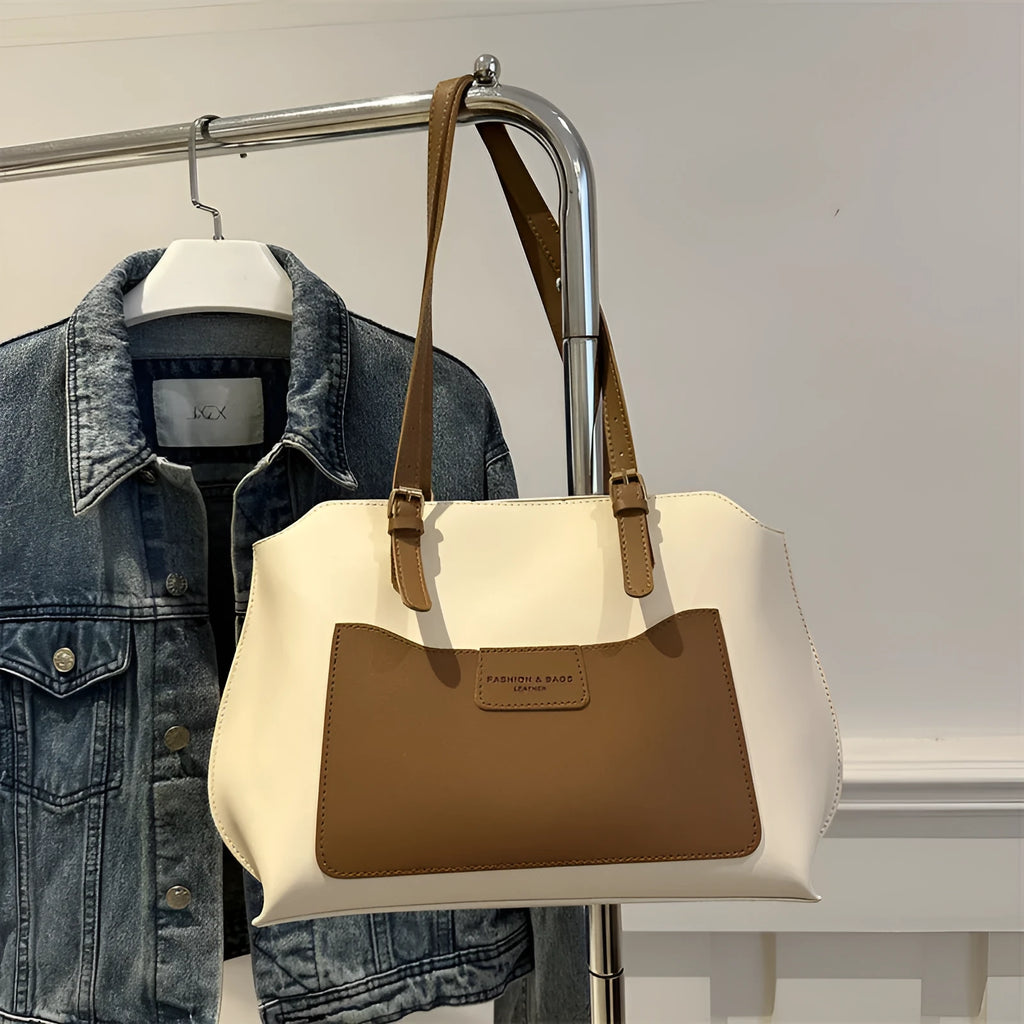 Women's structured PU tote bag in a horizontal square shape with double shoulder straps, shown in a neutral colour.