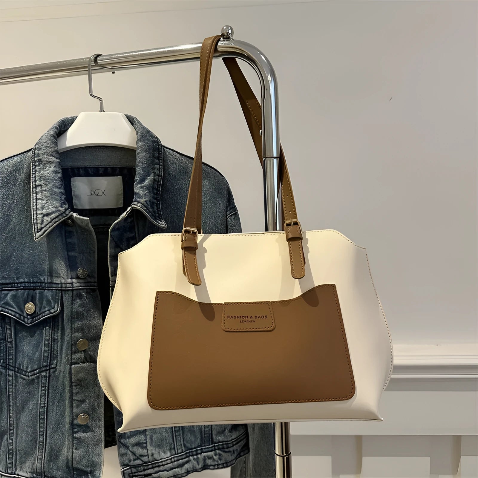 Women's structured PU tote bag in a horizontal square shape with double shoulder straps, shown in a neutral colour.