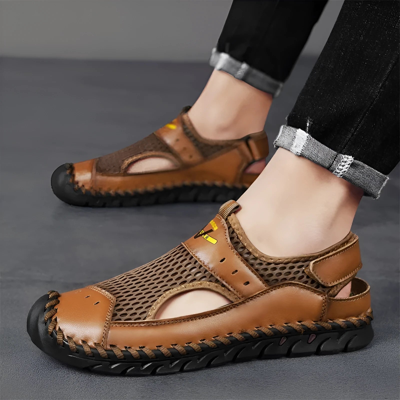 Men's brown leather mesh hollow shoes with round toe and elastic band, showing sewing line details