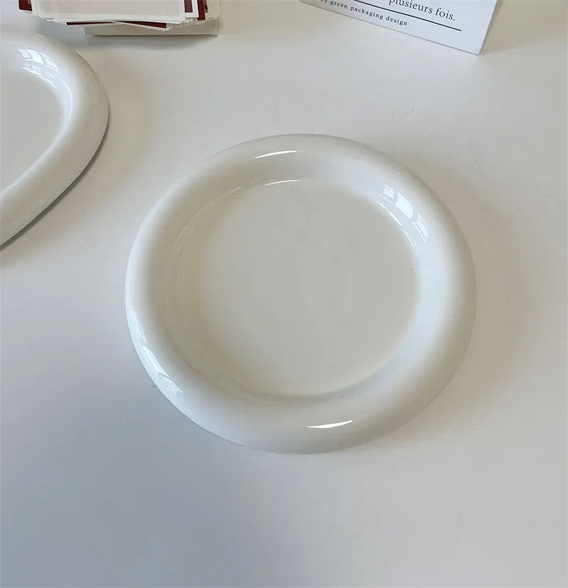 White porcelain plate with ins style doodle or bear toot pattern, shown in 15cm and 20cm sizes.
