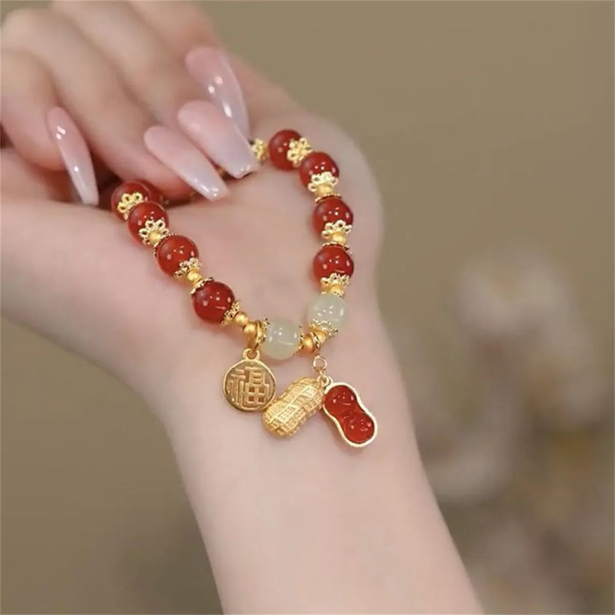 Coloured glass bracelet with rabbit motif in national style design for unisex wear
