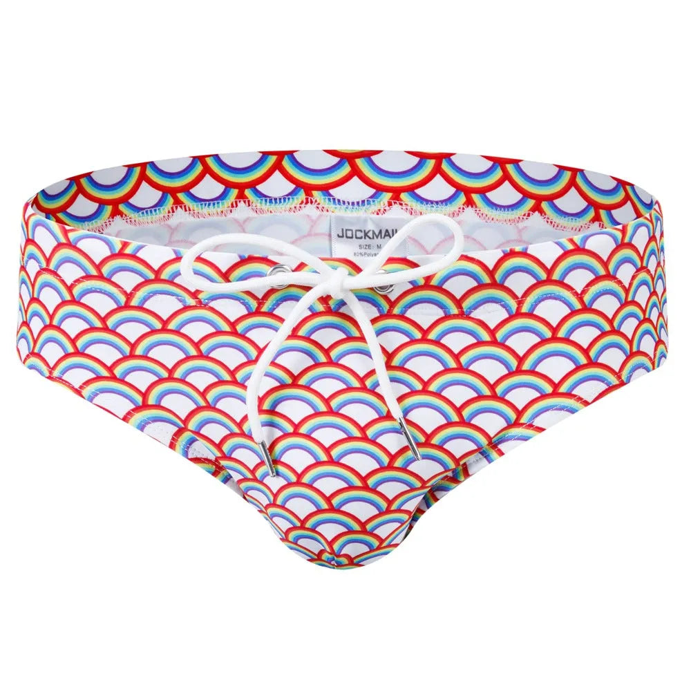 Men's low waist triangle nylon swimming trunks in solid colour with pattern, front view