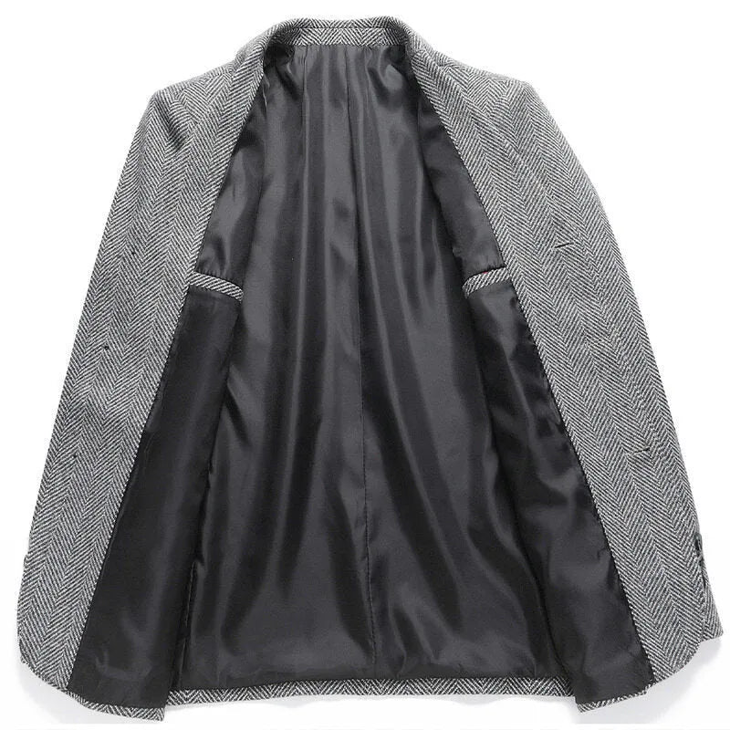 Man wearing a loose-fit solid colour wool-blend coat suitable for spring or autumn casual wear.