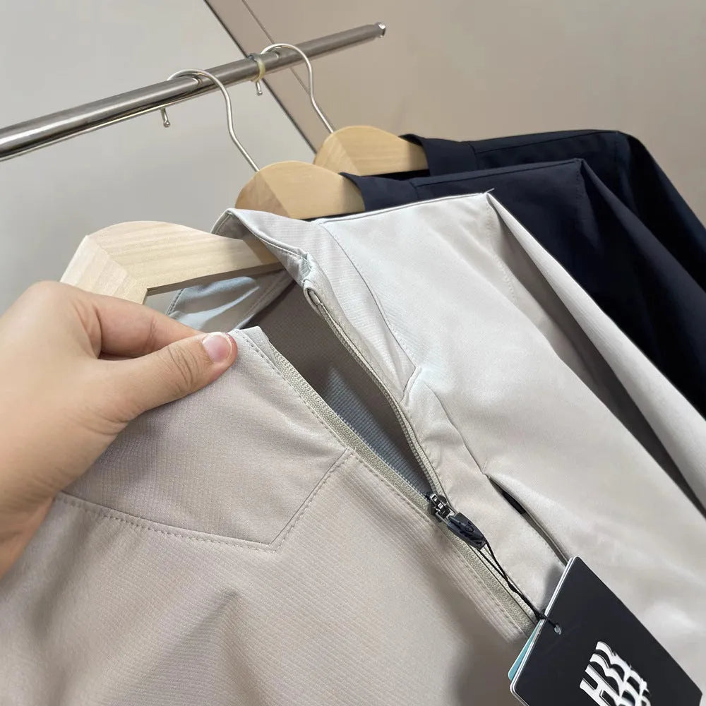 Men's black stand collar polyester sports casual jacket with long sleeves and straight hem