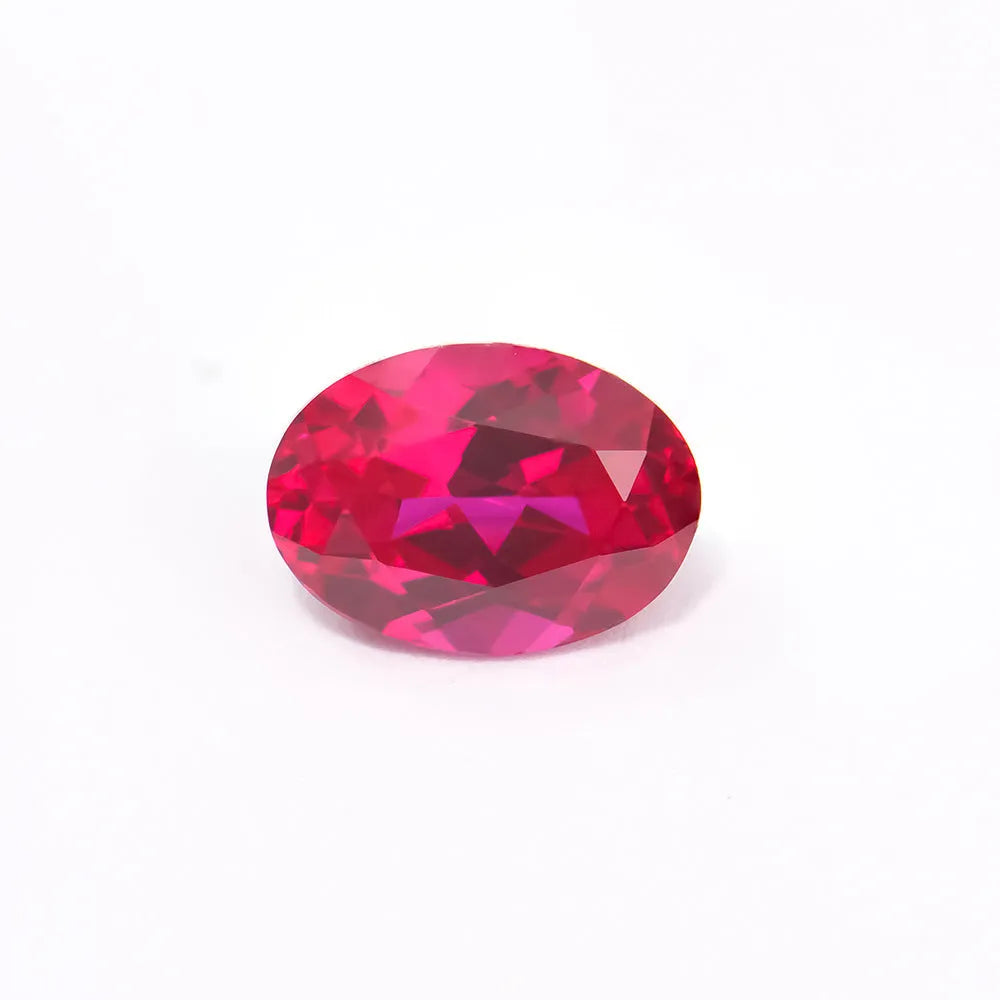 Artificial cultivated ruby gemstone showing red colour in various carat weights and shape options